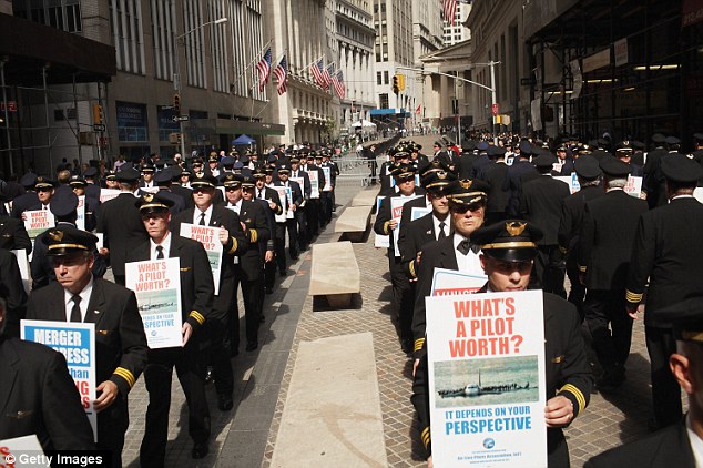 United: Over 700 hundred Continental and United pilots, joined by additional pilots from other Air Line Pilots Association (ALPA) carriers, demonstrate in front of Wall Street on Tuesday